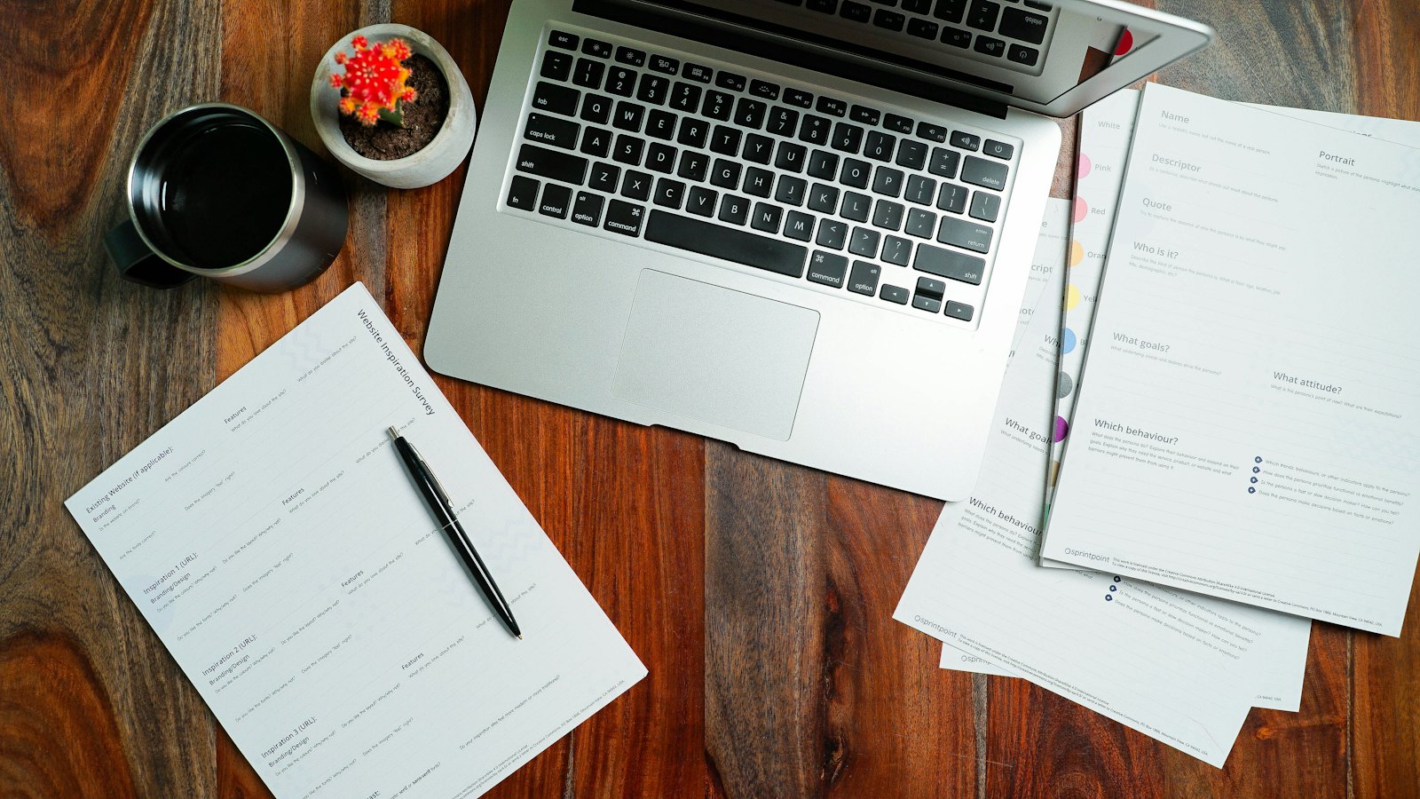 Small business owner at a laptop working out what is business automation and which admin tasks to automate